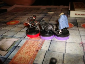 A Dragonborn Swordmage comes to the defense of a bloodied Rogue, and marks the Spectral Panther attacking.