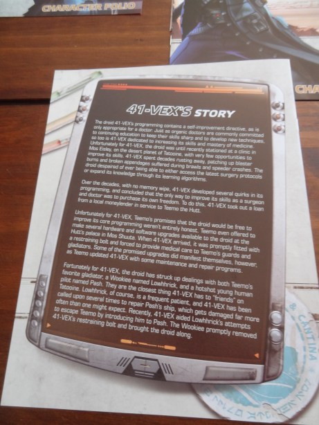 The back of each character folio has backstory. 